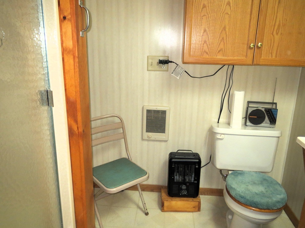 1027 Bluff Road Dixon, IL 61021 - Photo 21 of 48 a bathroom with a toilet and a sink