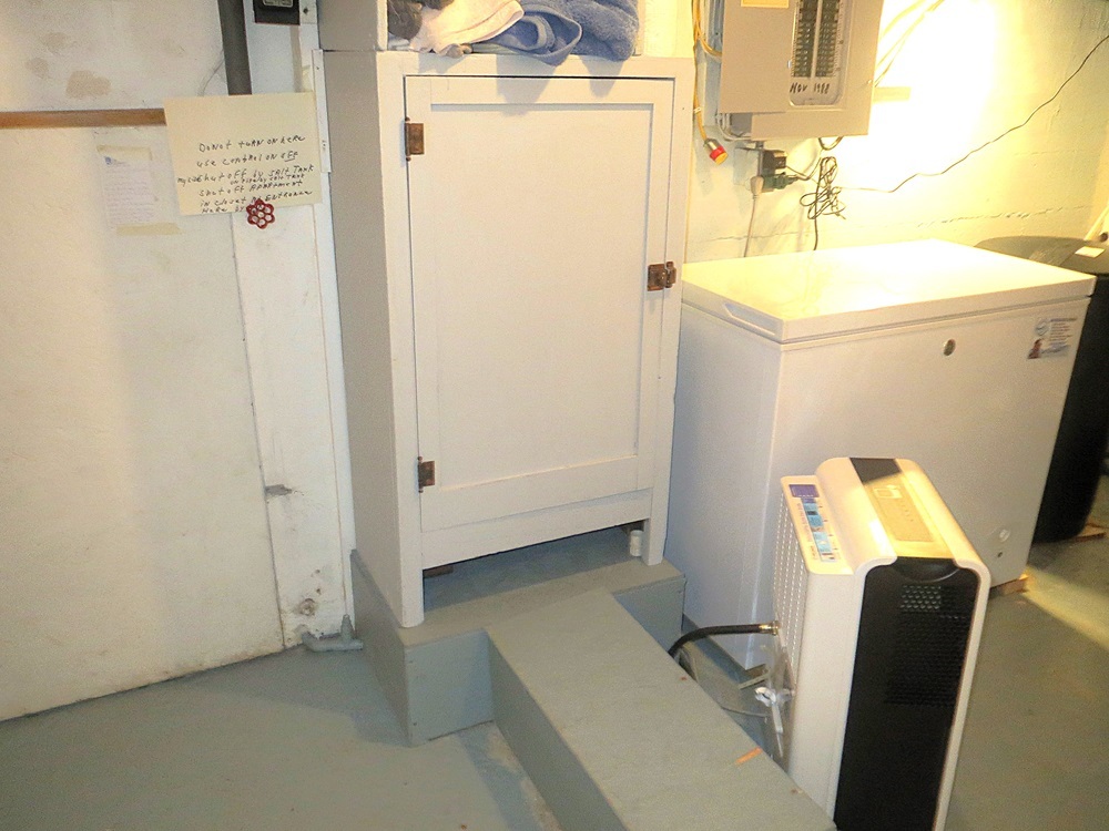 1027 Bluff Road Dixon, IL 61021 - Photo 23 of 48 a bathroom with a sink a refrigerator a washer and dryer