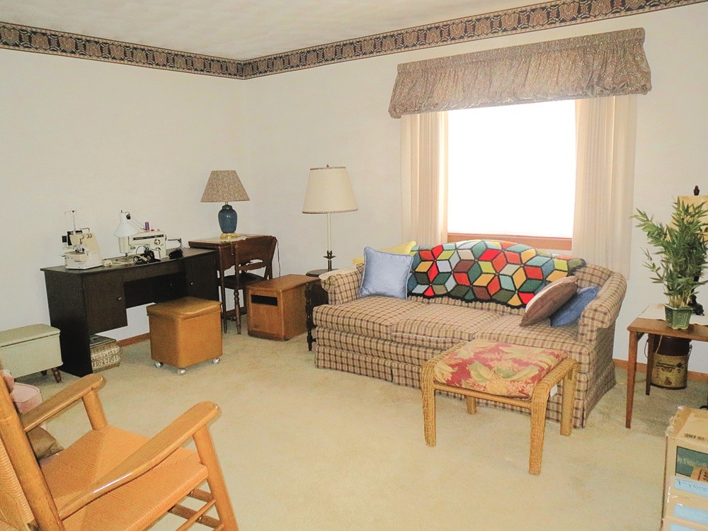 1027 Bluff Road Dixon, IL 61021 - Photo 30 of 48 a bedroom with a bed and a table