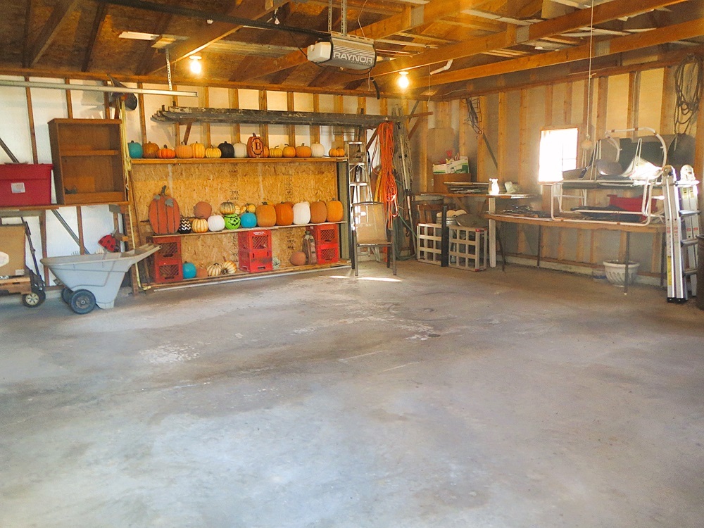 1027 Bluff Road Dixon, IL 61021 - Photo 35 of 48 a view of a room with racks on the wall