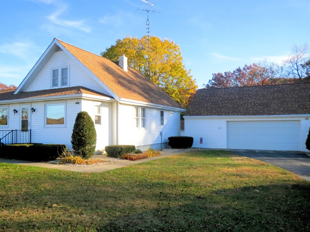 1027 Bluff Road Dixon, IL 61021 - Photo 48 of 48 a view of a house with backyard and sitting area