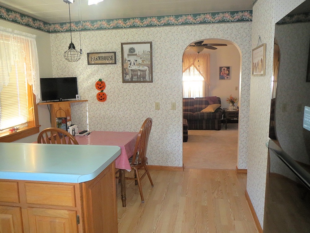 1027 Bluff Road Dixon, IL 61021 - Photo 10 of 48 a dining room with a table and chairs
