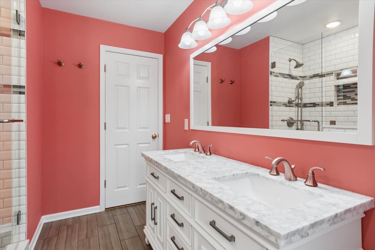 1232 Laurel Lane Naperville, IL 60540 - Photo 12 of 24 a bathroom with a sink vanity granite and a mirror