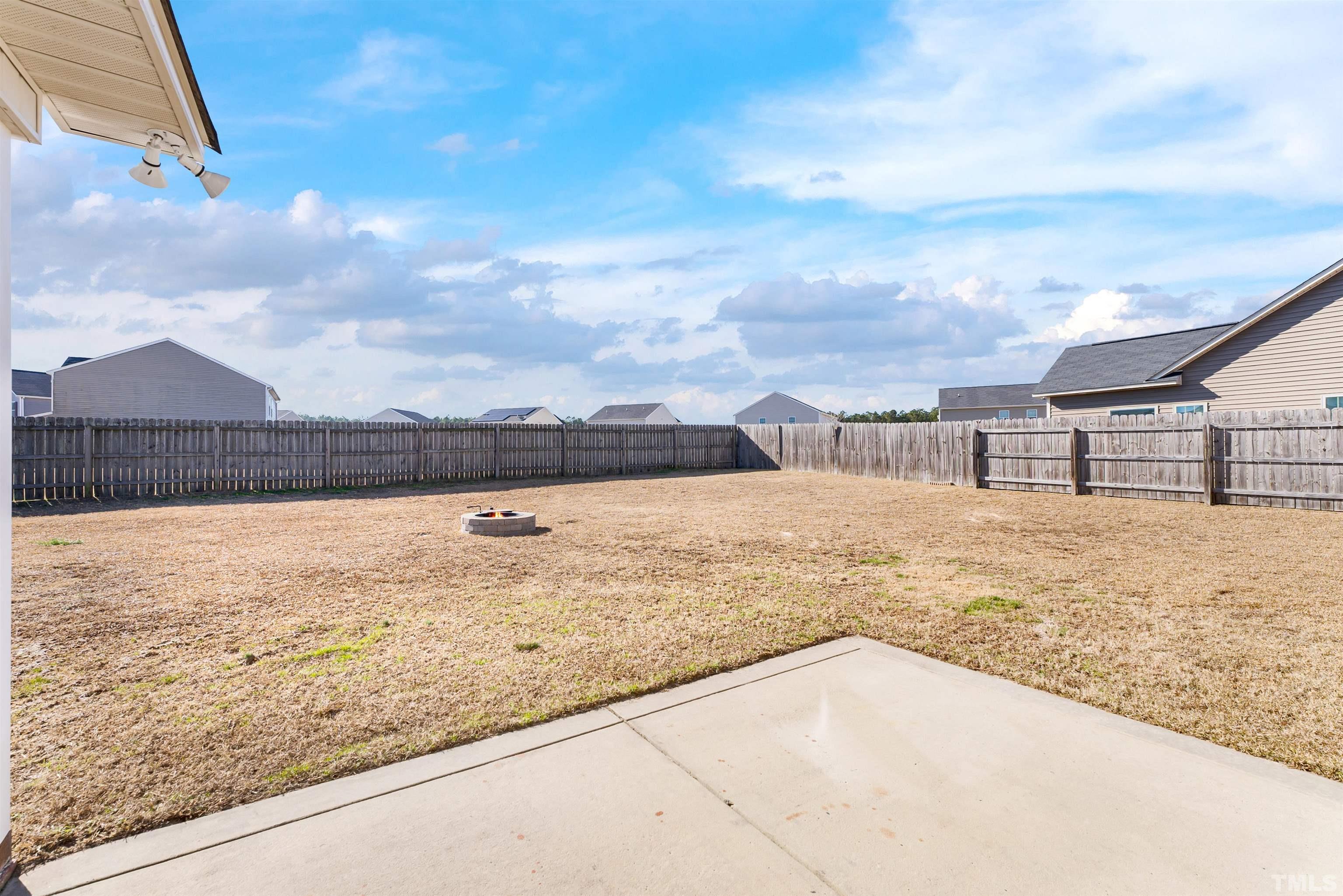 707 Botanical Court Bunnlevel, NC 28323 - Photo 27 of 31 a view of swimming pool with a yard