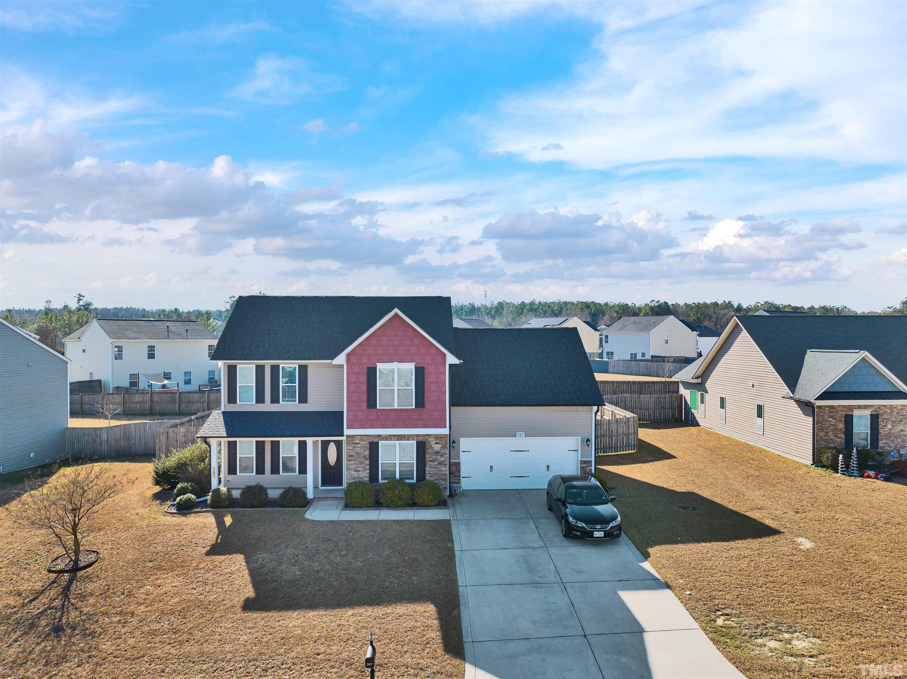 707 Botanical Court Bunnlevel, NC 28323 - Photo 29 of 31 a front view of a house with a yard