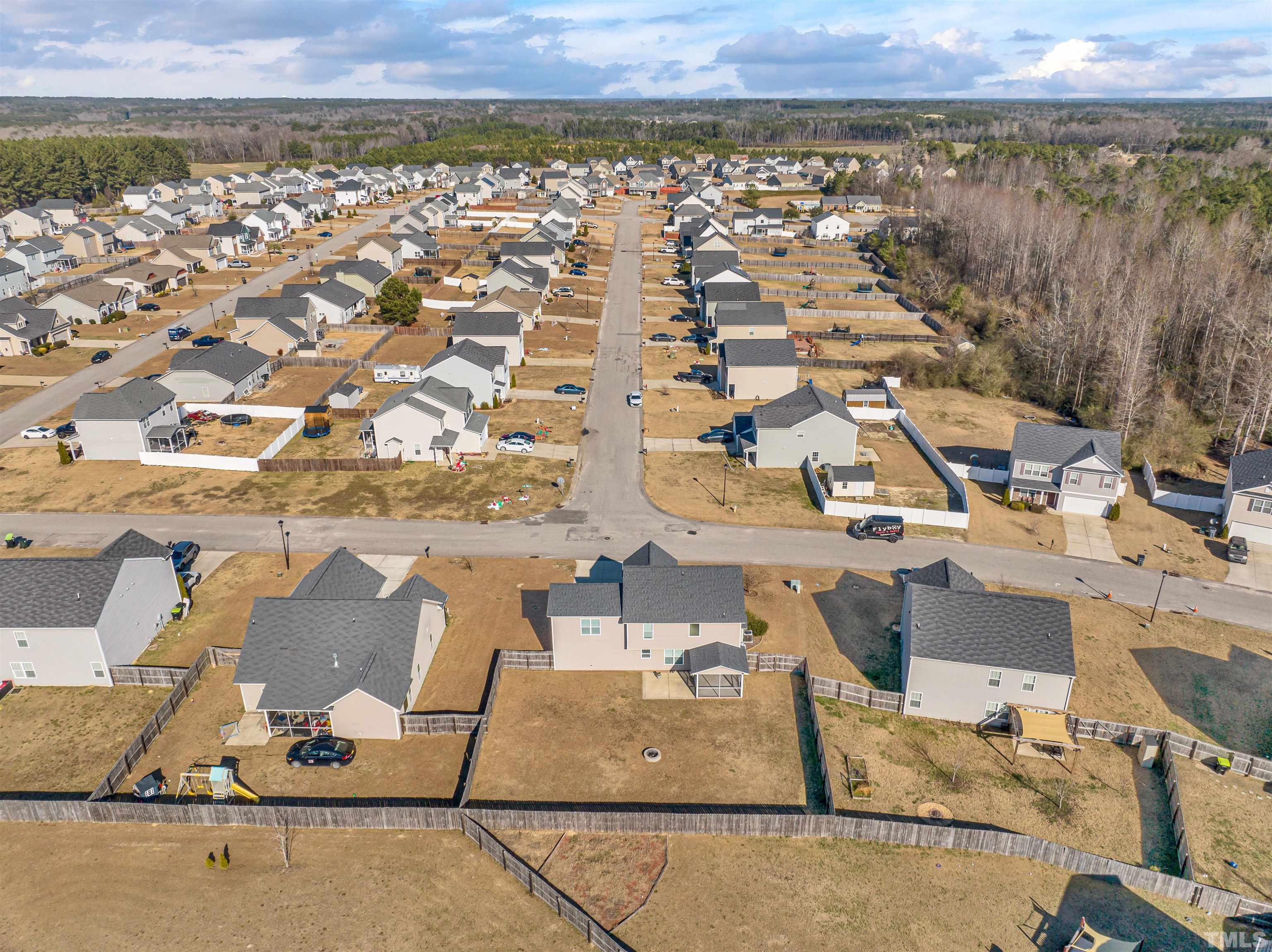707 Botanical Court Bunnlevel, NC 28323 - Photo 30 of 31 an aerial view of residential houses with outdoor space