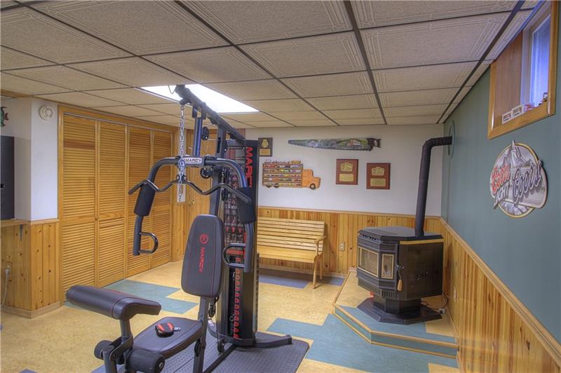 388 Rohrmann Road Darlington, PA 16115 - Photo 13 of 25 Game Room as you enter from the Garage. Quality Commercial grade flooring (soft)!