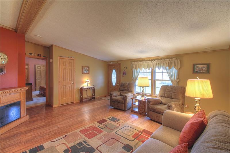 Living Room with Commercial grade flooring.