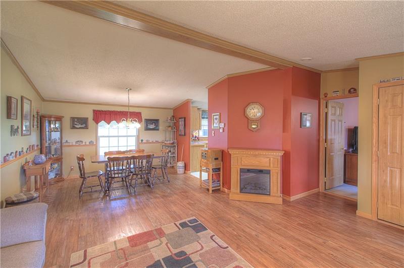 388 Rohrmann Road Darlington, PA 16115 - Photo 9 of 25 Living and Dining Rooms. Coat closet at right (partially shown).