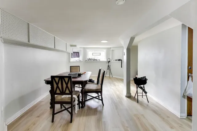a kitchen with sink and a window