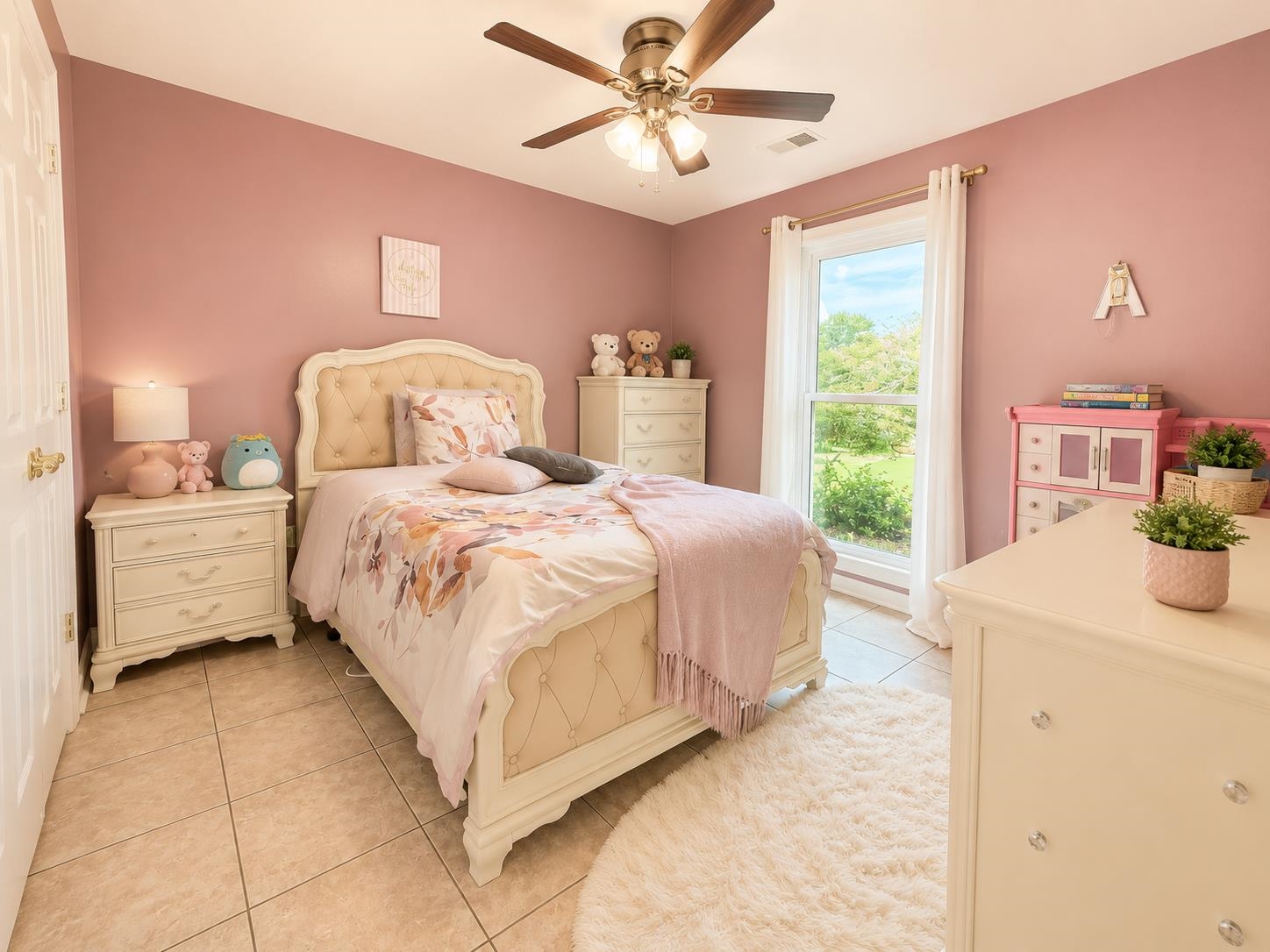 326 South Sanga Road Cordova, TN 38018 - Photo 22 of 32 Spacious room with a large window, tile flooring, and a ceiling fan with integrated lighting