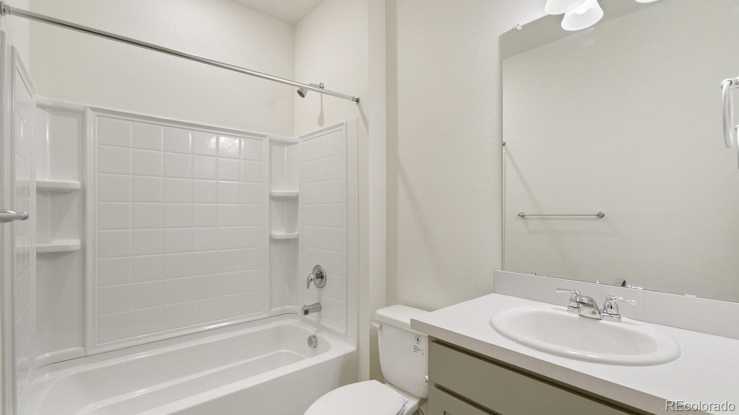 950 London Way Severance, CO 80550 - Photo 20 of 21 a bathroom with a sink toilet and shower