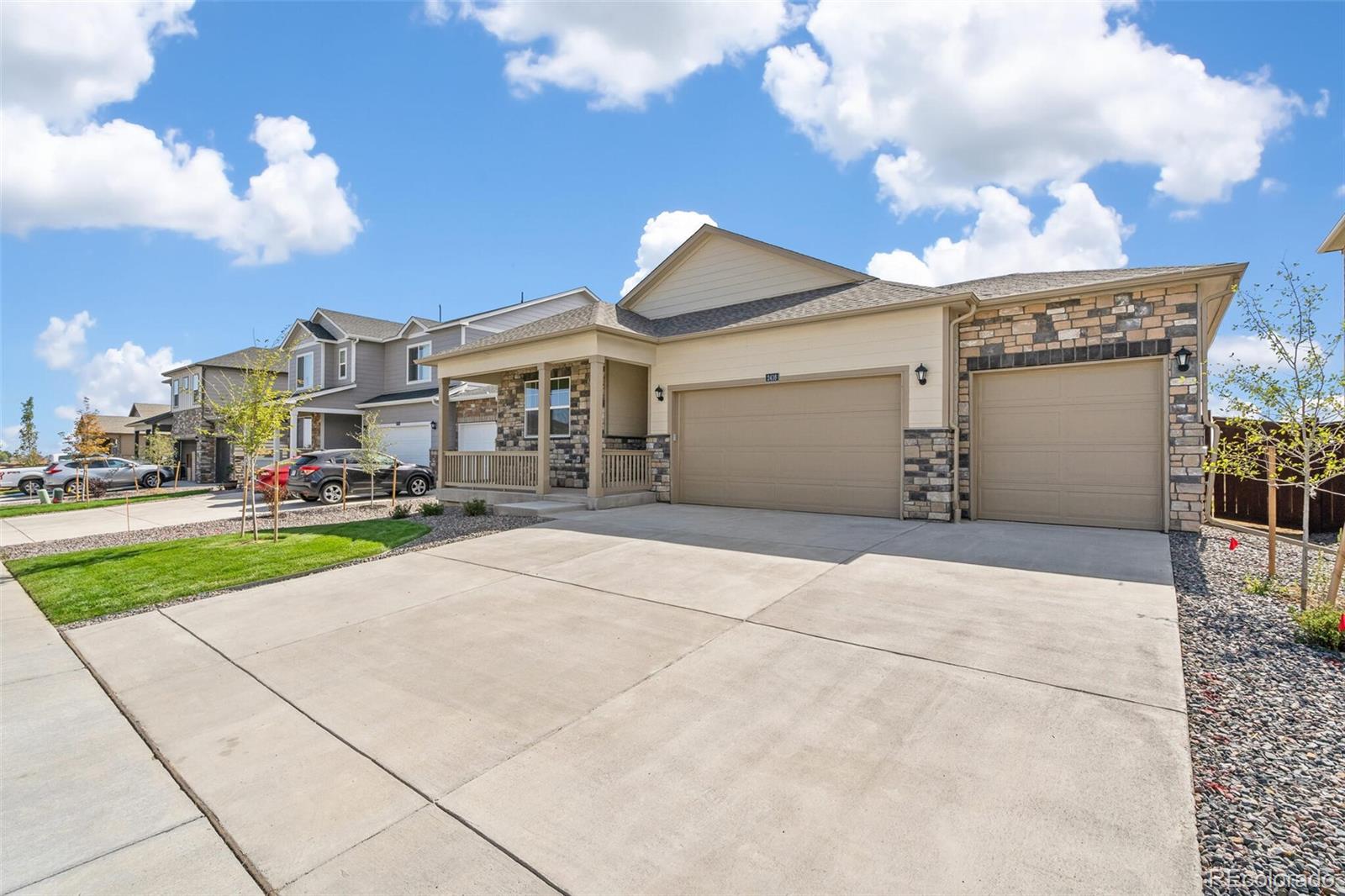 950 London Way Severance, CO 80550 - Photo 2 of 21 a view of a building with a yard