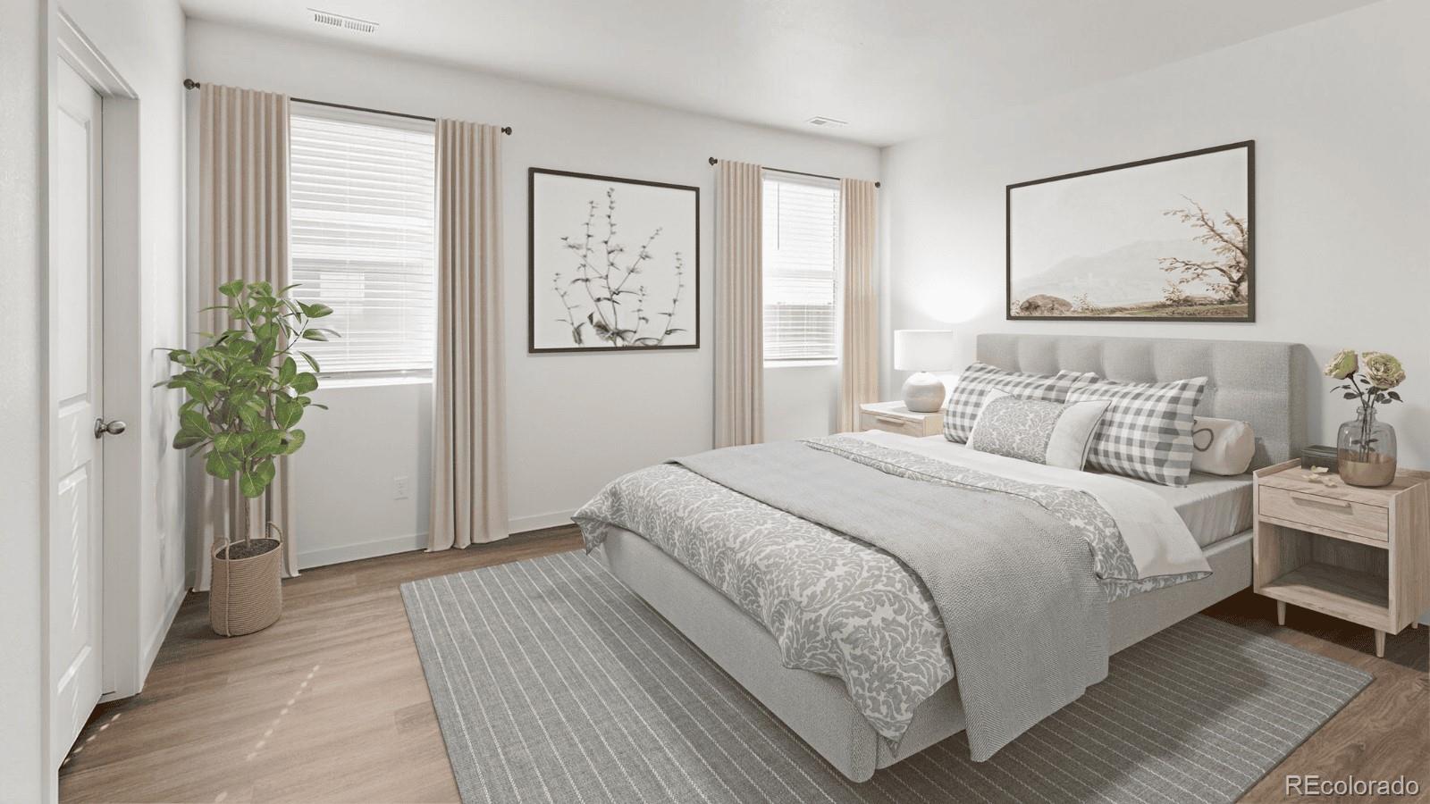 950 London Way Severance, CO 80550 - Photo 6 of 21 a bedroom with a bed and a painting on the wall