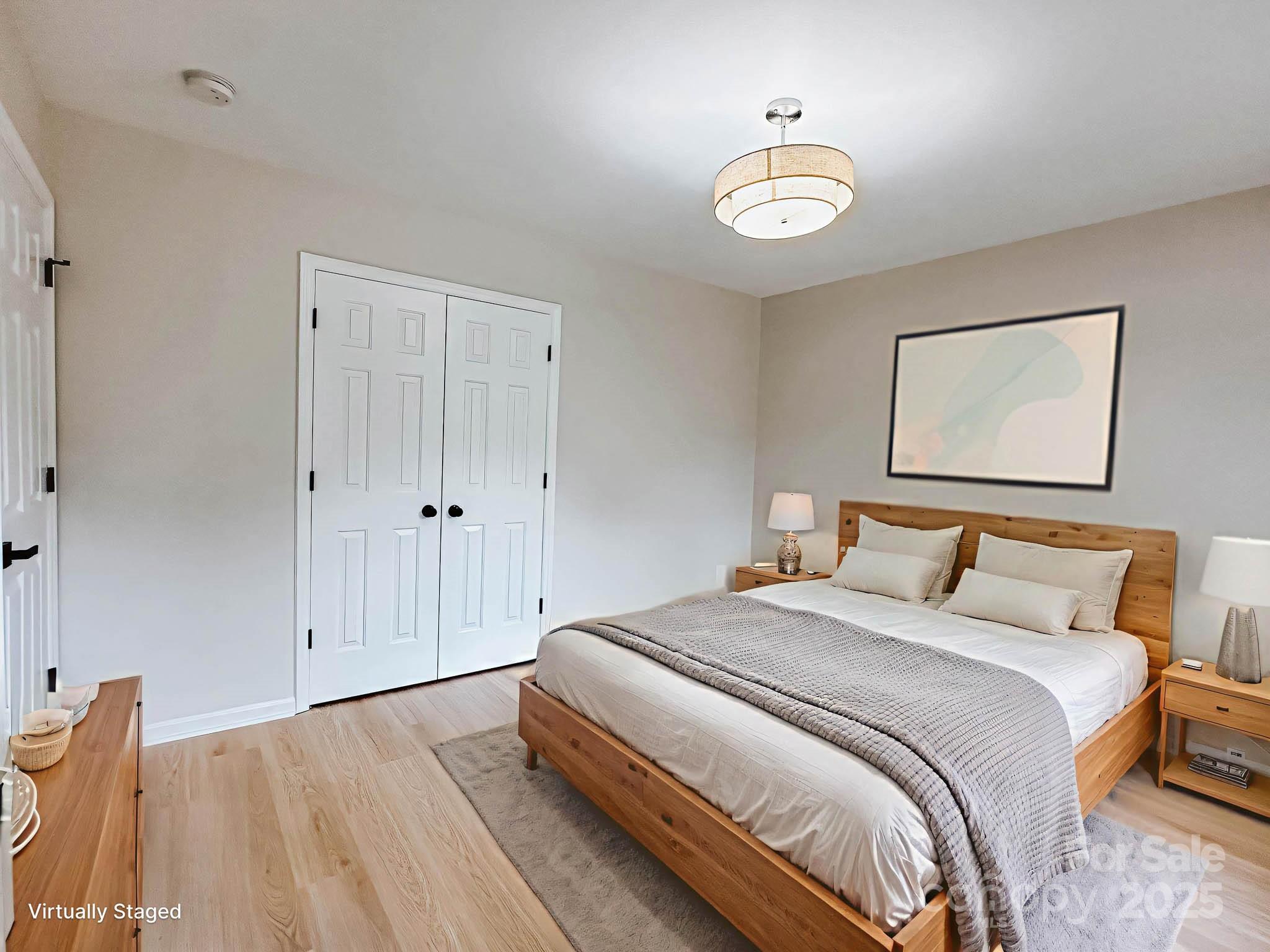 2105 Killarney Place Charlotte, NC 28262 - Photo 32 of 43 a bedroom with bed and a window