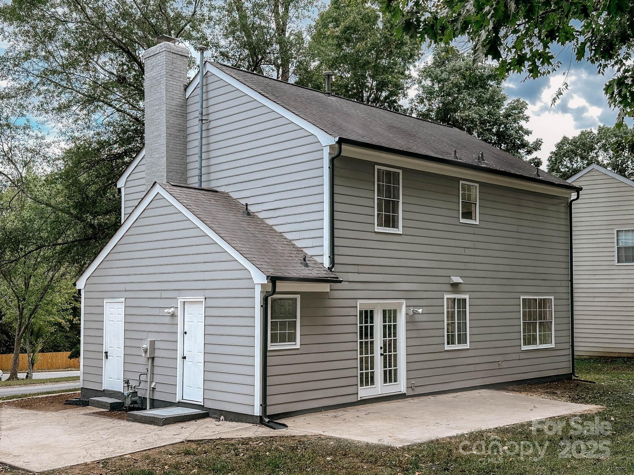 2105 Killarney Place Charlotte, NC 28262 - Photo 39 of 43 a view of a house with a yard and garage