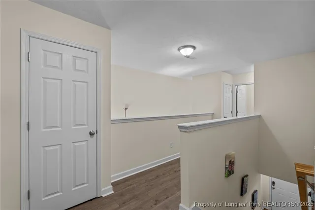 a view of storage and utility room with closet