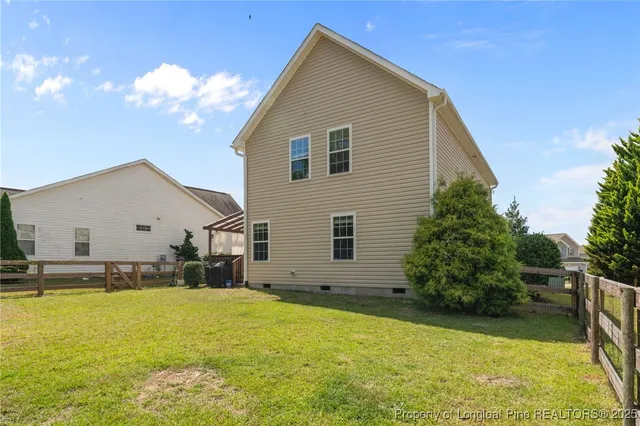a view of a house with swimming pool