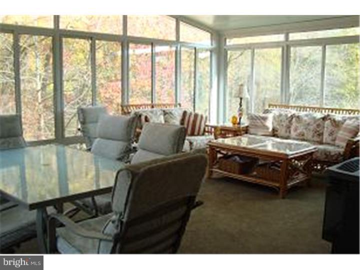 4313 Riders Lane Boothwyn, PA 19061 - Photo 18 of 21 Sun Room