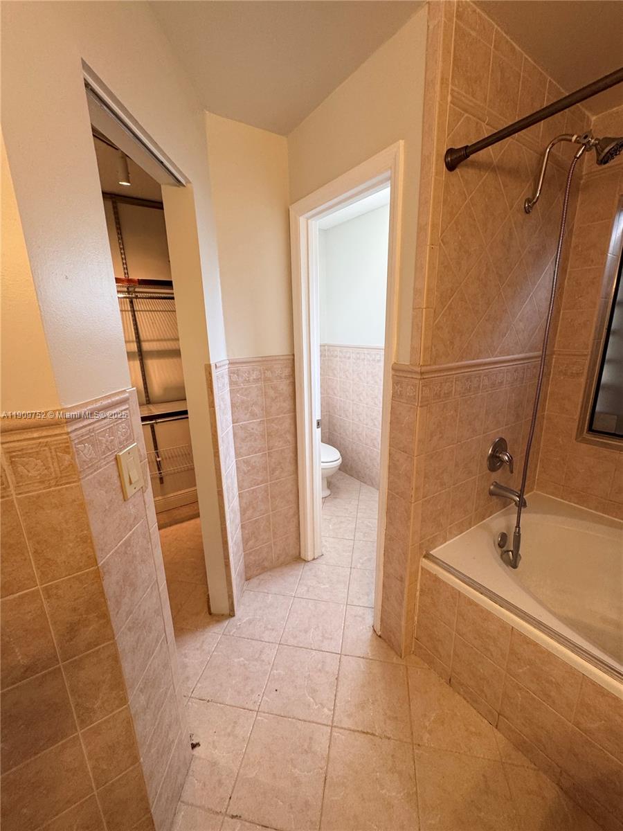 17910 Southwest 137th Court Miami, FL 33177 - Photo 11 of 25 a bathroom with a sink and shower