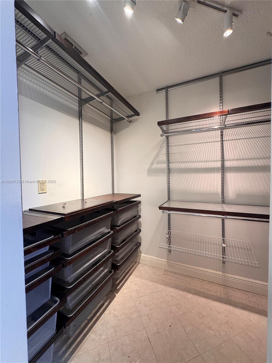 17910 Southwest 137th Court Miami, FL 33177 - Photo 12 of 25 a locker room with wooden floor