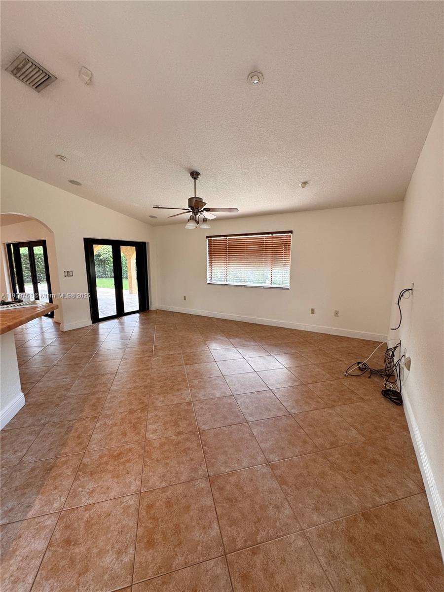 17910 Southwest 137th Court Miami, FL 33177 - Photo 3 of 25 wooden floor in an empty room