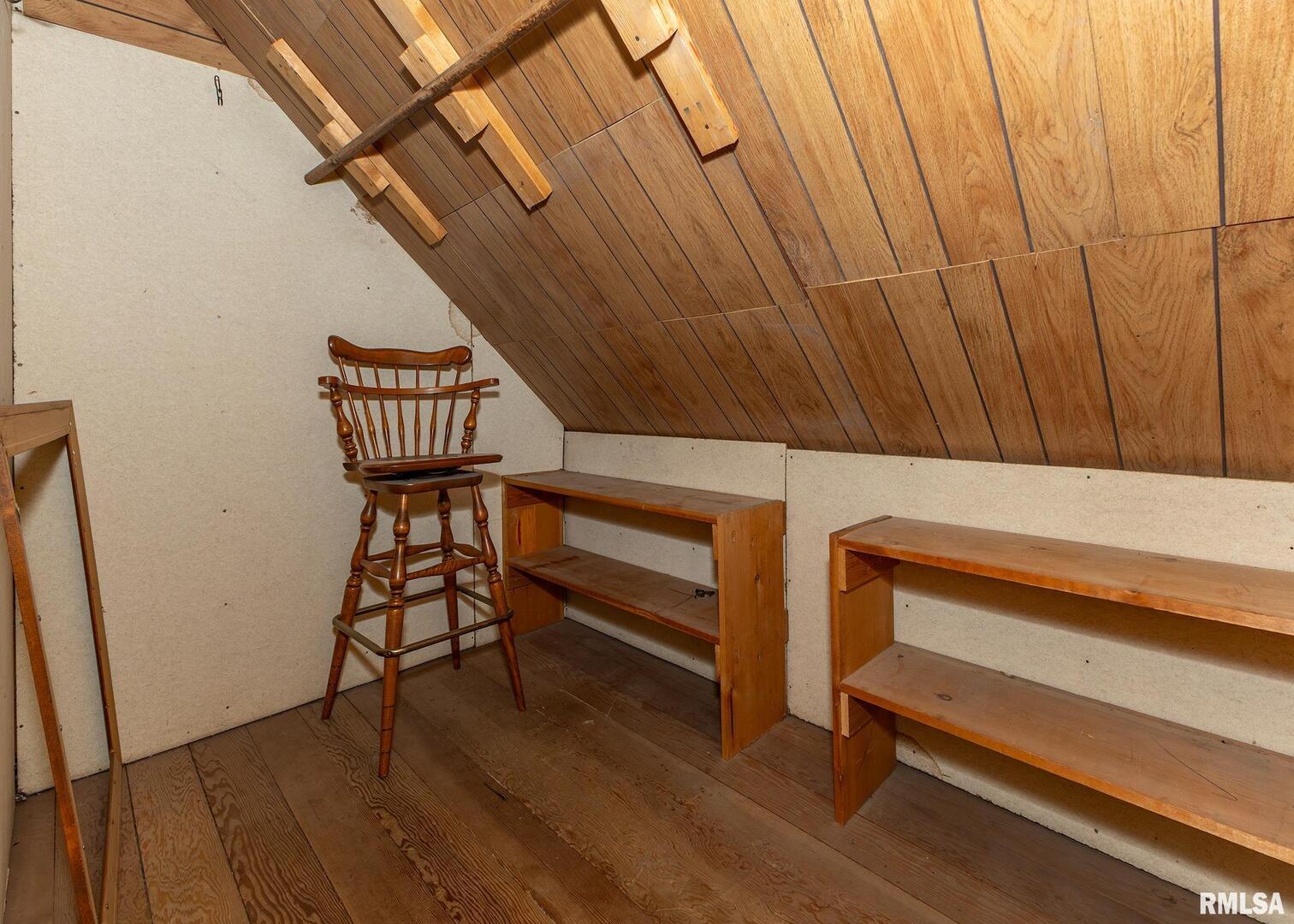 304 South 5th Avenue New Windsor, IL 61465 - Photo 23 of 29 a view of a room with wooden floor and chair