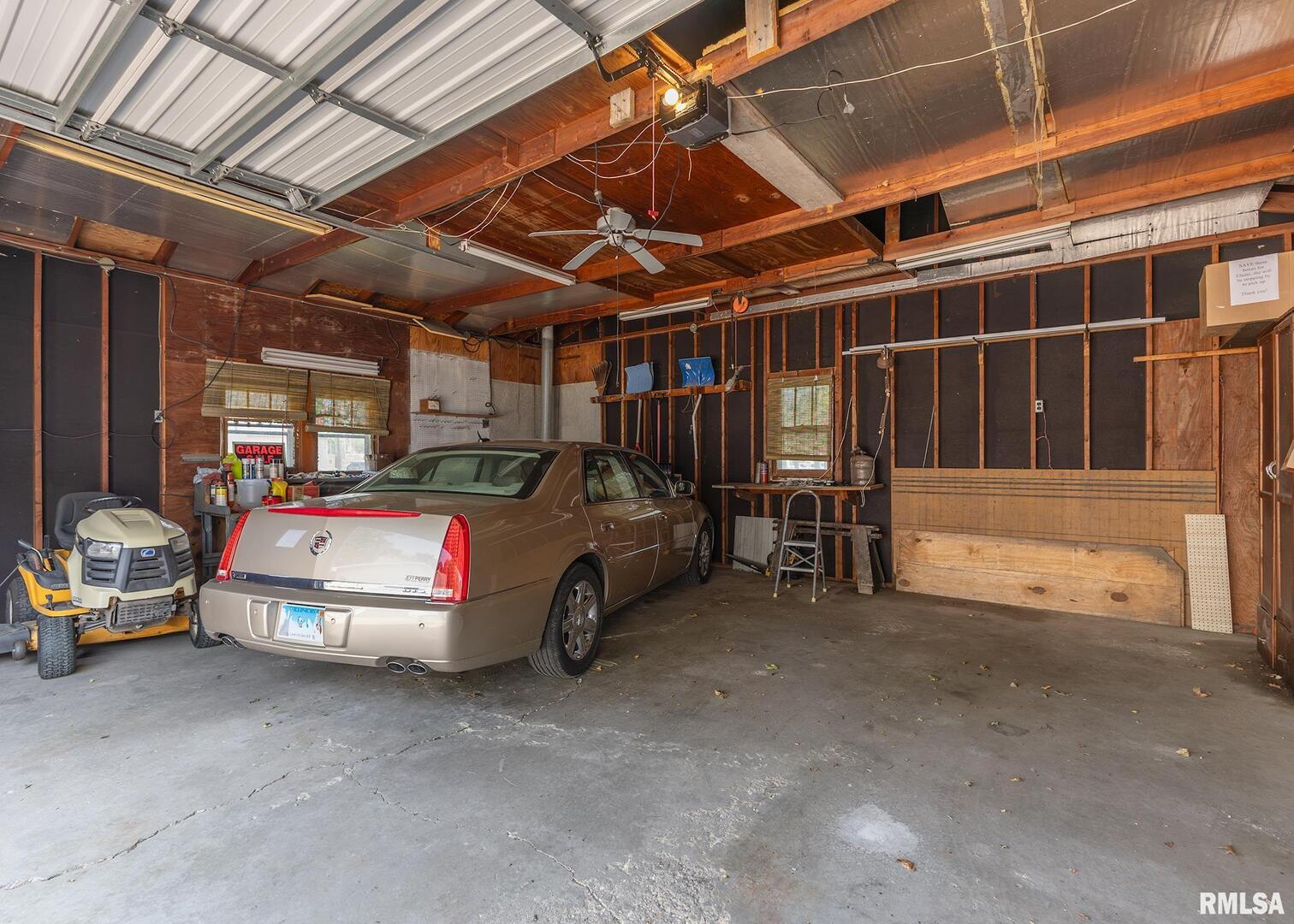 304 South 5th Avenue New Windsor, IL 61465 - Photo 24 of 29 a view of car garage
