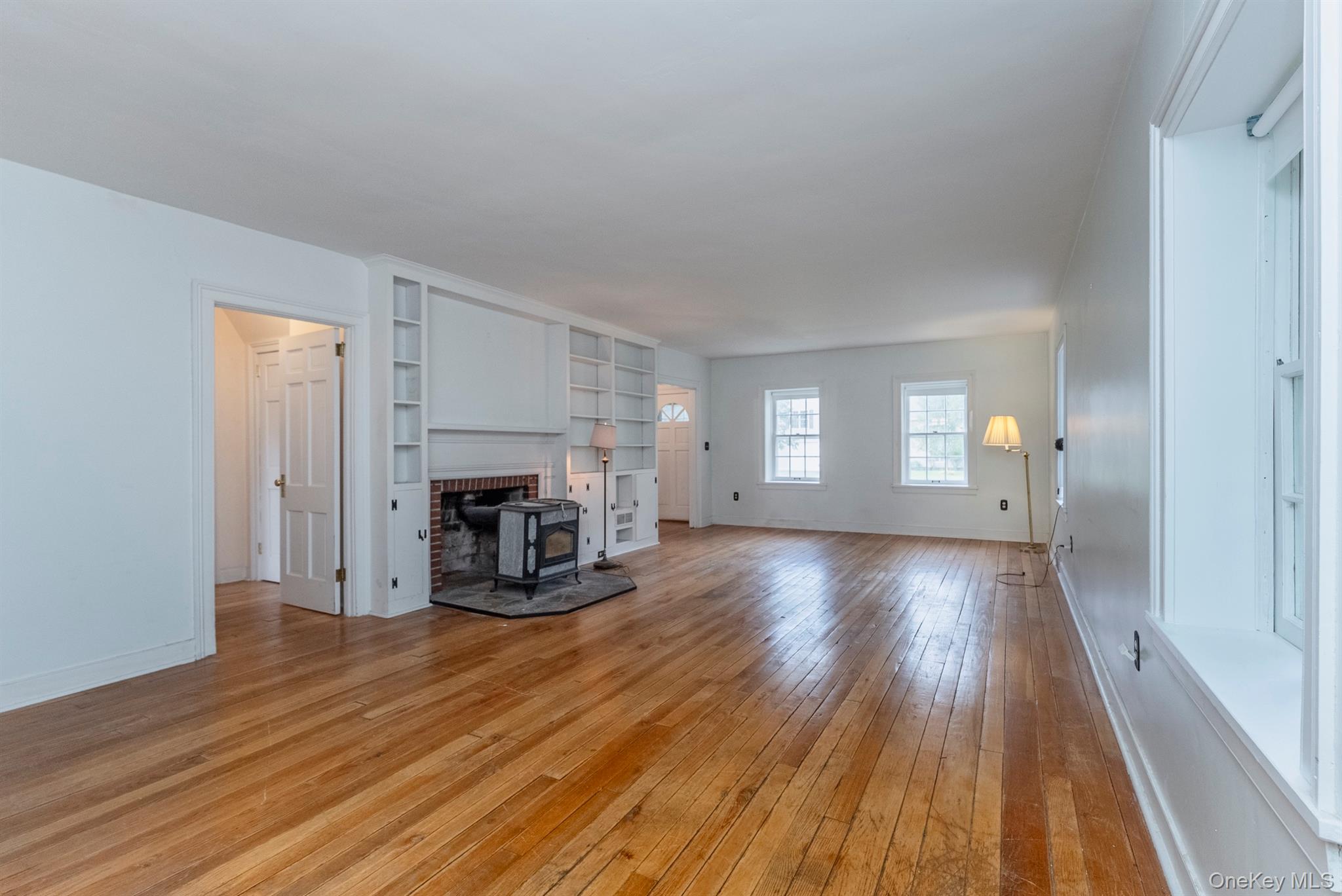 12 Zandhoek Road Hurley, NY 12443 - Photo 16 of 50 a view of a livingroom with a fireplace and window