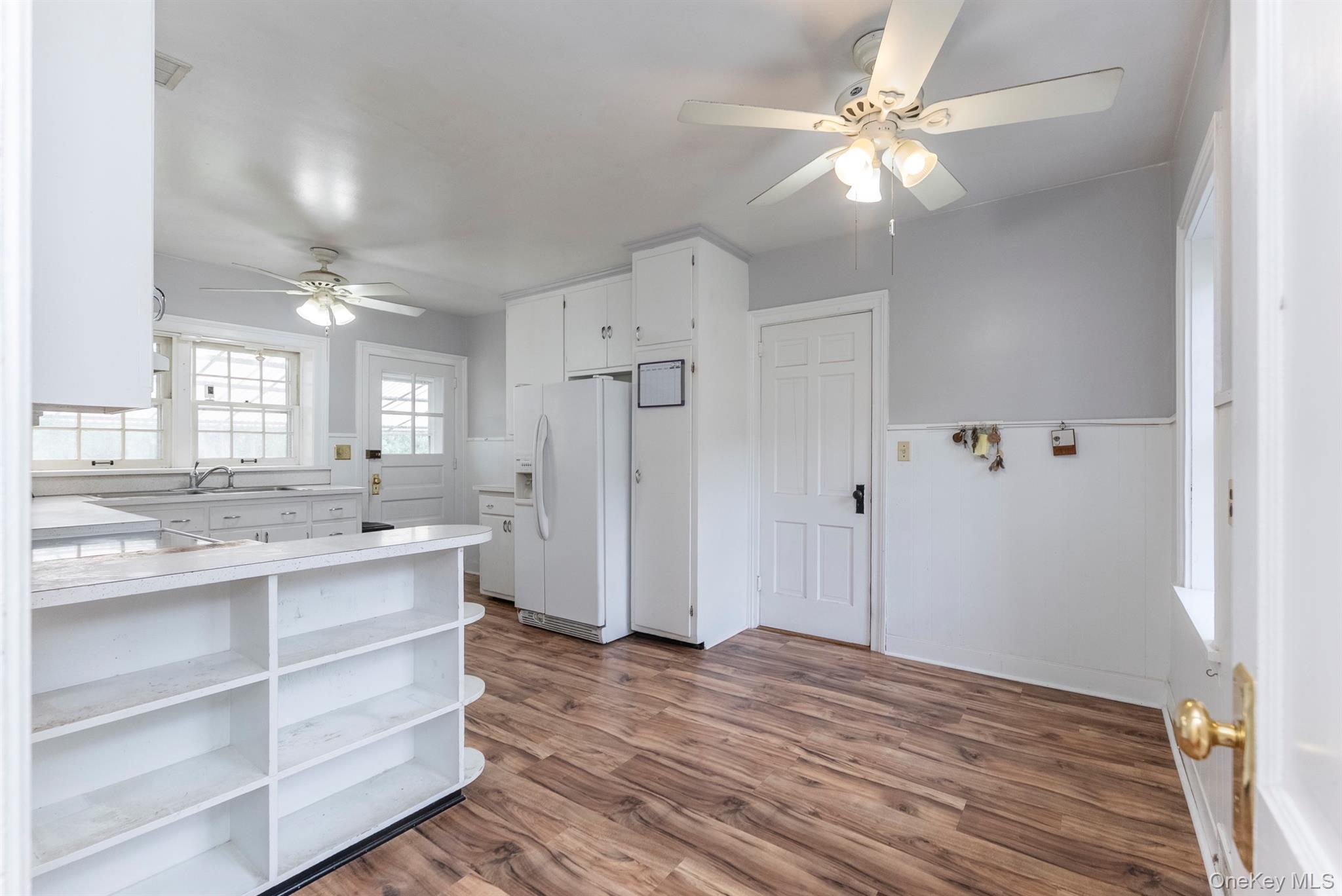 12 Zandhoek Road Hurley, NY 12443 - Photo 20 of 50 a view of a kitchen with a sink cabinets and wooden floor