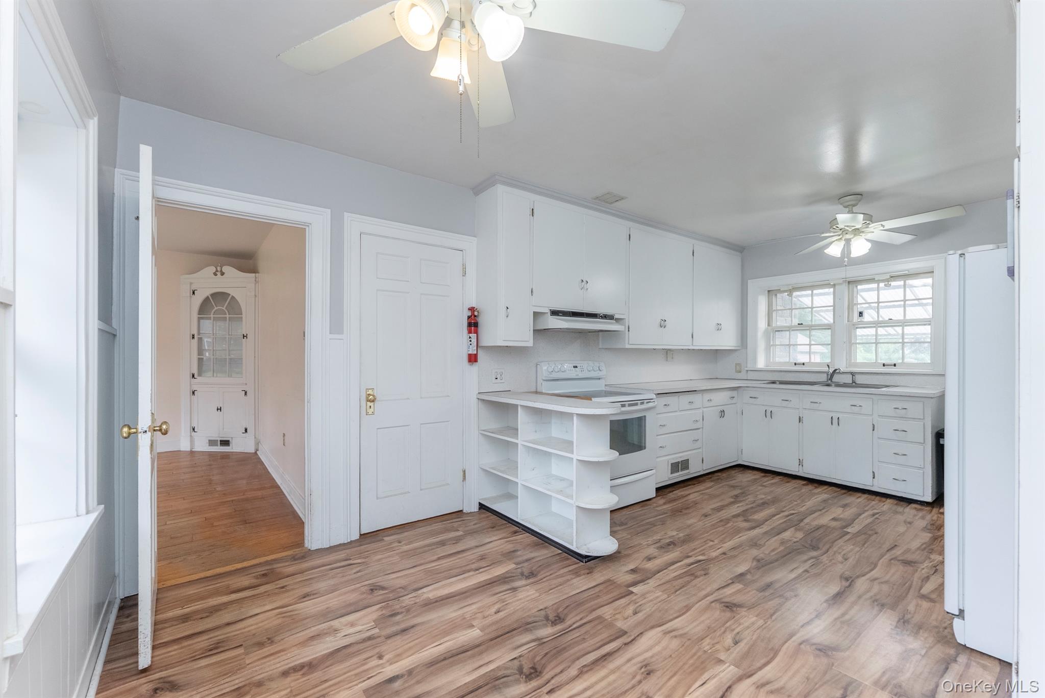 12 Zandhoek Road Hurley, NY 12443 - Photo 22 of 50 a kitchen with white cabinets and window