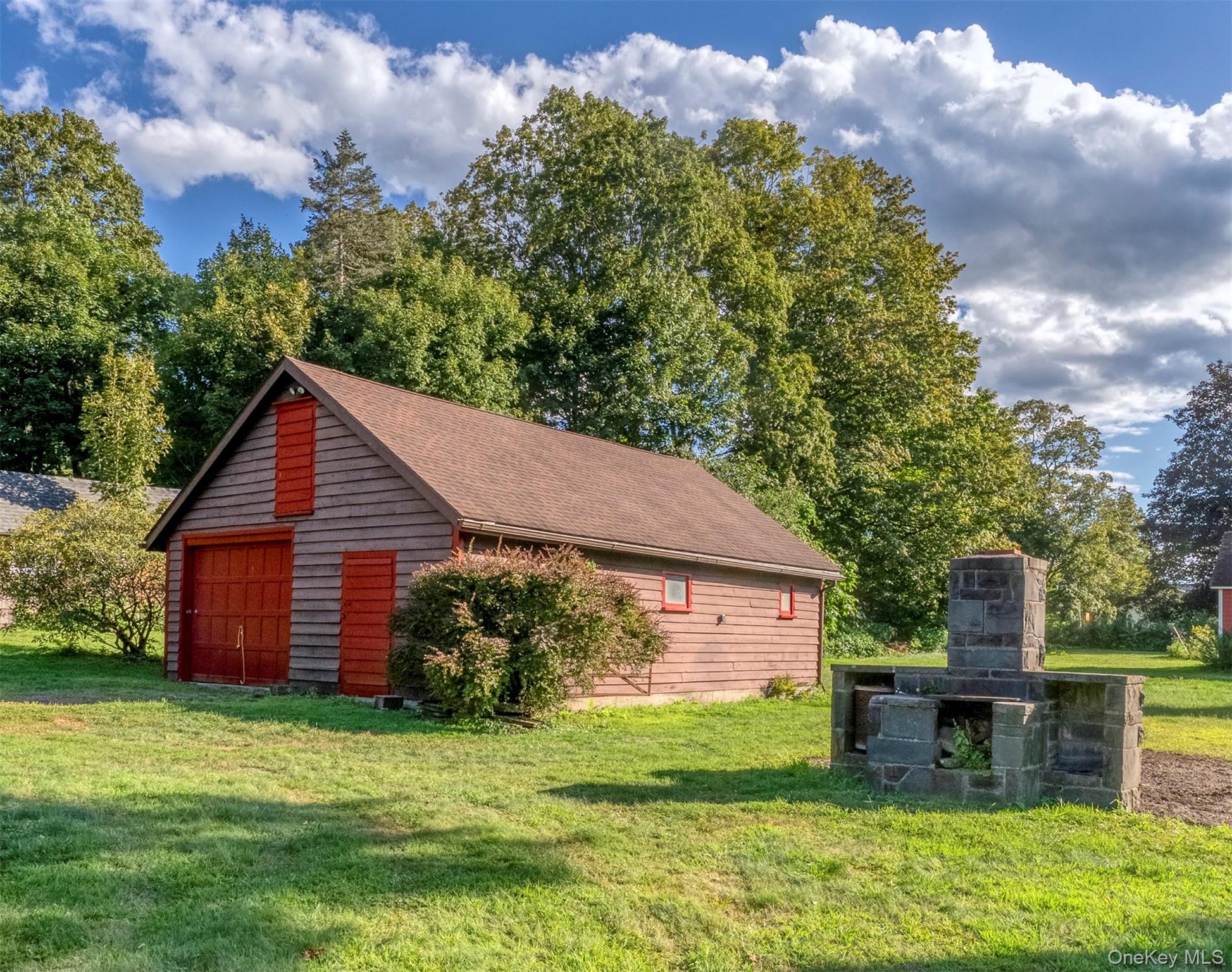 12 Zandhoek Road Hurley, NY 12443 - Photo 41 of 50 a view of a house with a yard potted plants and a large tree