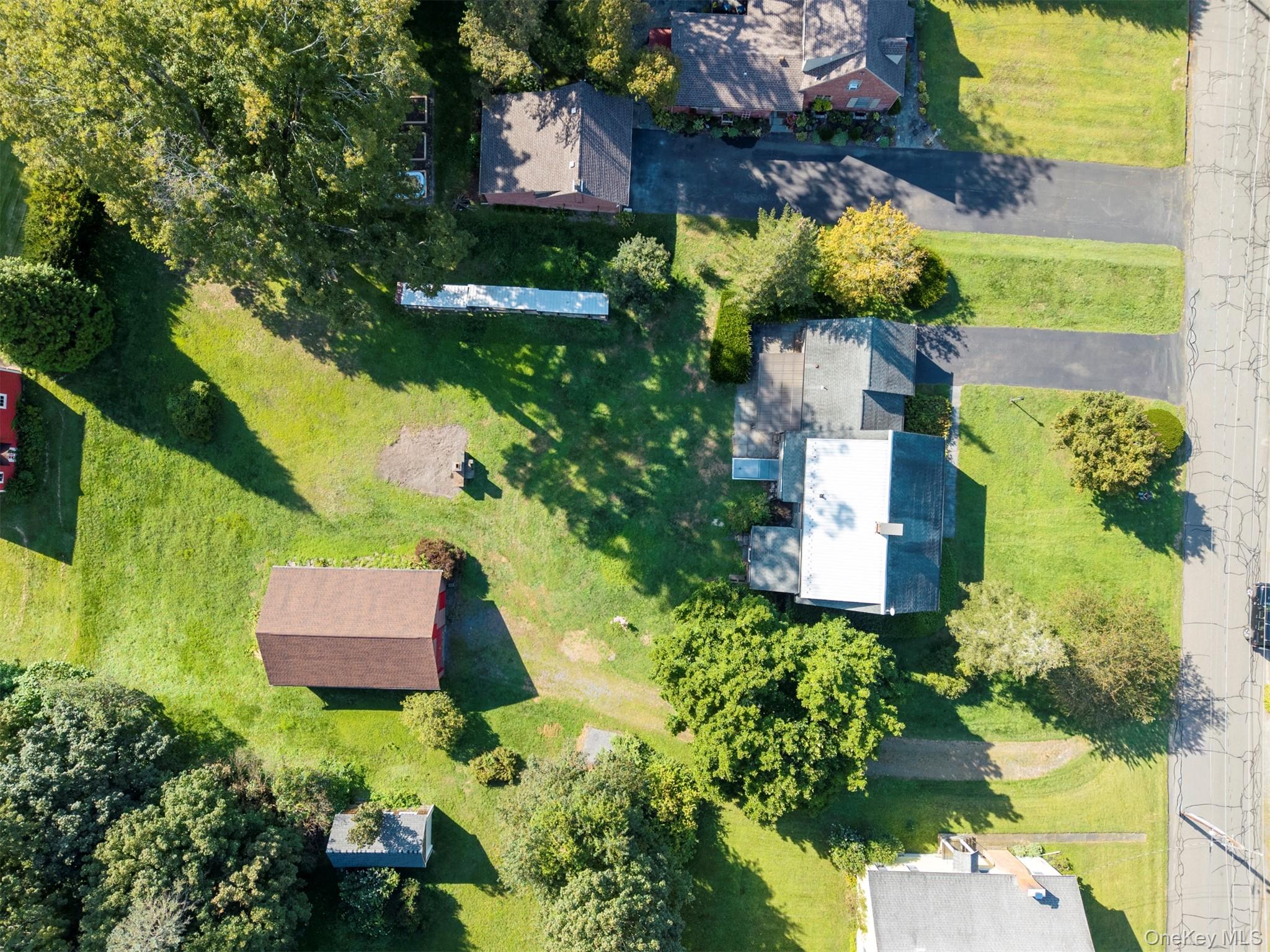 12 Zandhoek Road Hurley, NY 12443 - Photo 47 of 50 an aerial view of a house with a yard and a large tree