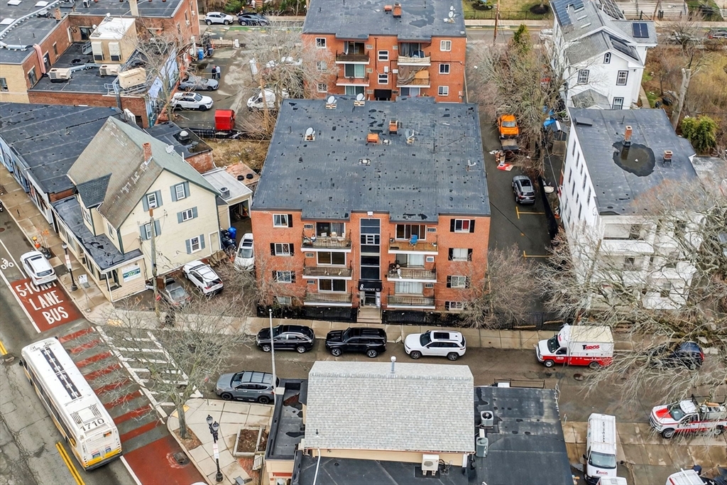 8 Kittredge Street, Unit 10 Boston, MA 02131 - Photo 15 of 16 an aerial view of residential houses with outdoor space