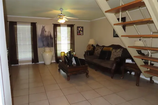 a living room with furniture and a window