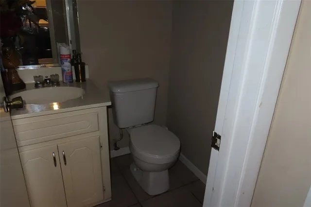 a bathroom with a toilet and a sink