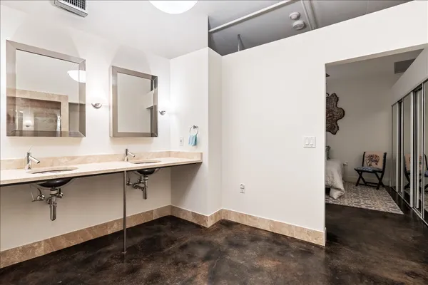 a bathroom with a sink and a mirror