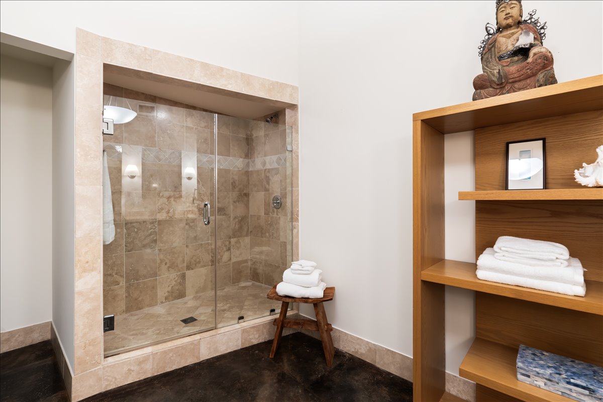 311 West 5th Street, Unit 1005 Austin, TX 78701 - Photo 18 of 30 The warm, neutral tones, soft lighting, and high-end materials like marble or stone create a soothing ambiance
