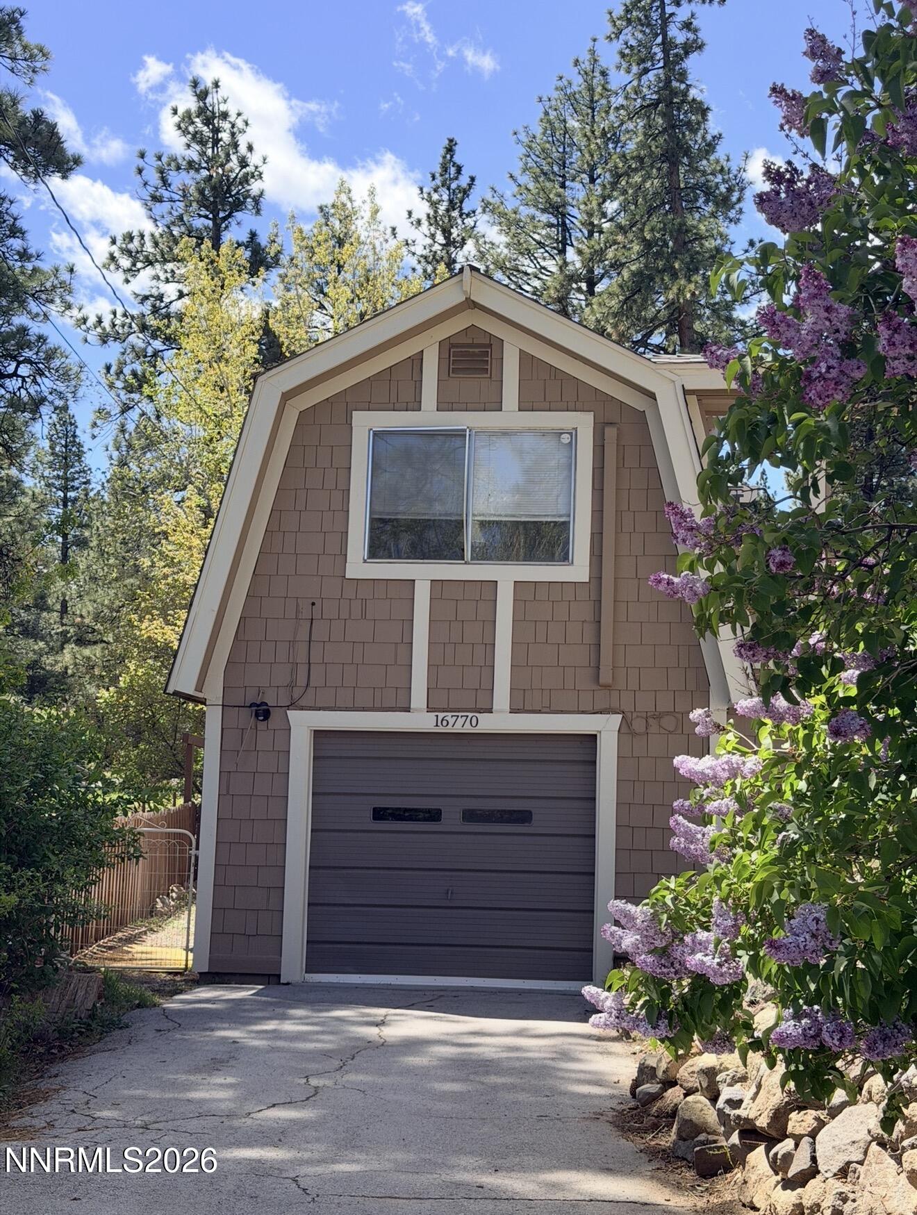 16770 Mt Rose Highway, Unit B Reno, NV 89511 - Photo 1 of 26 a front view of a house