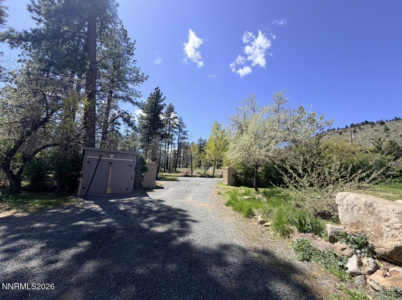 16770 Mt Rose Highway, Unit B Reno, NV 89511 - Photo 18 of 26 a view of a backyard with a house