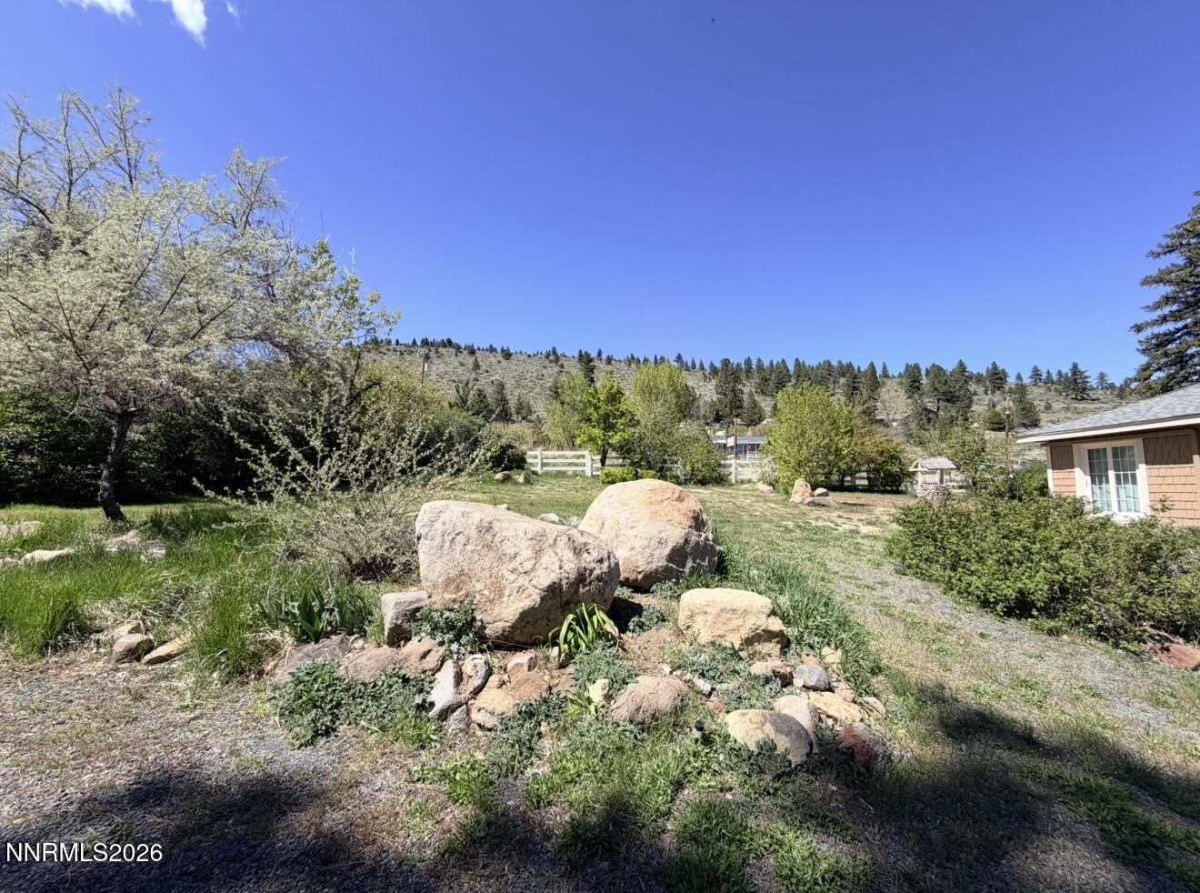 16770 Mt Rose Highway, Unit B Reno, NV 89511 - Photo 19 of 26 a view of houses with a yard