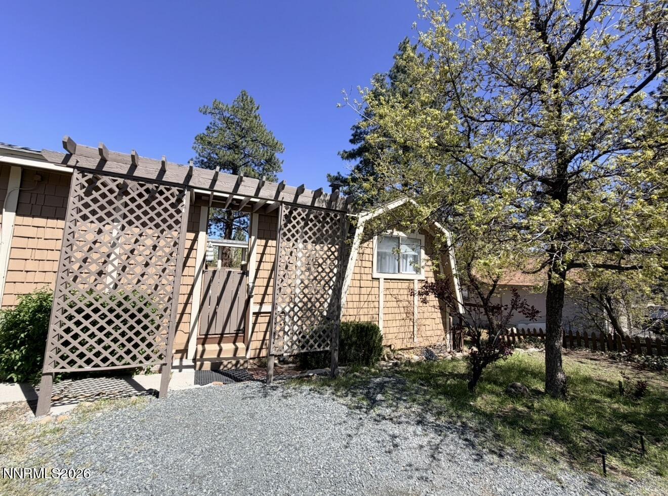 16770 Mt Rose Highway, Unit B Reno, NV 89511 - Photo 21 of 26 a view of a house with a yard