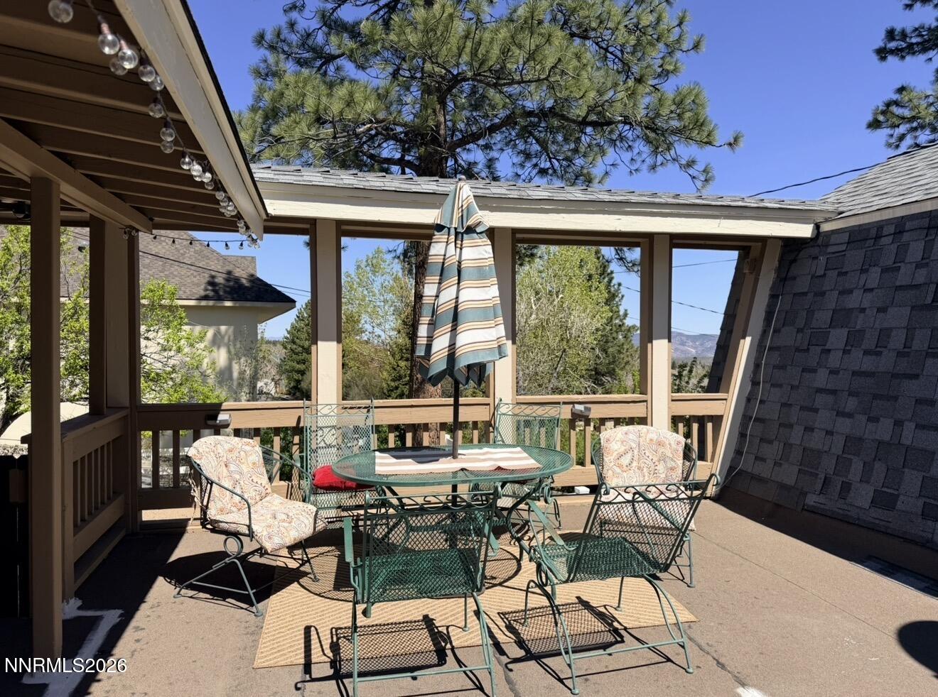 16770 Mt Rose Highway, Unit B Reno, NV 89511 - Photo 25 of 26 a view of a chairs and table in the balcony