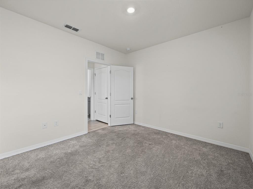 4223 San Rocco Way Winter Haven, FL 33884 - Photo 14 of 47 a view of an empty room