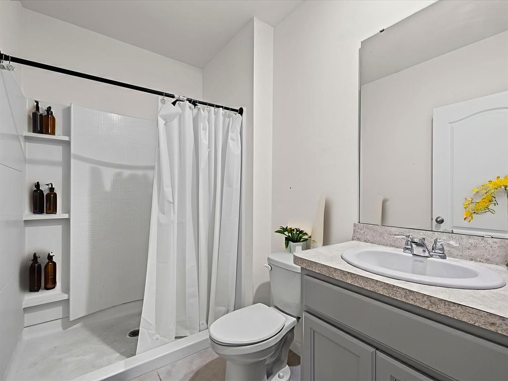 4223 San Rocco Way Winter Haven, FL 33884 - Photo 15 of 47 a bathroom with a sink toilet and shower