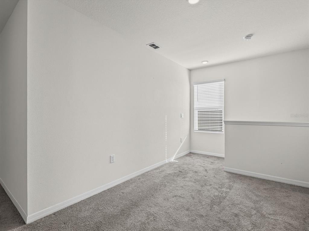 4223 San Rocco Way Winter Haven, FL 33884 - Photo 18 of 47 a view of an empty room