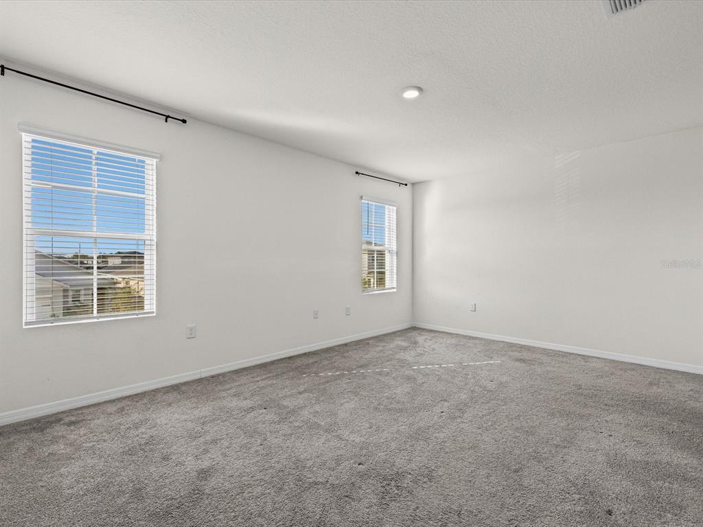 4223 San Rocco Way Winter Haven, FL 33884 - Photo 20 of 47 an empty room with a window