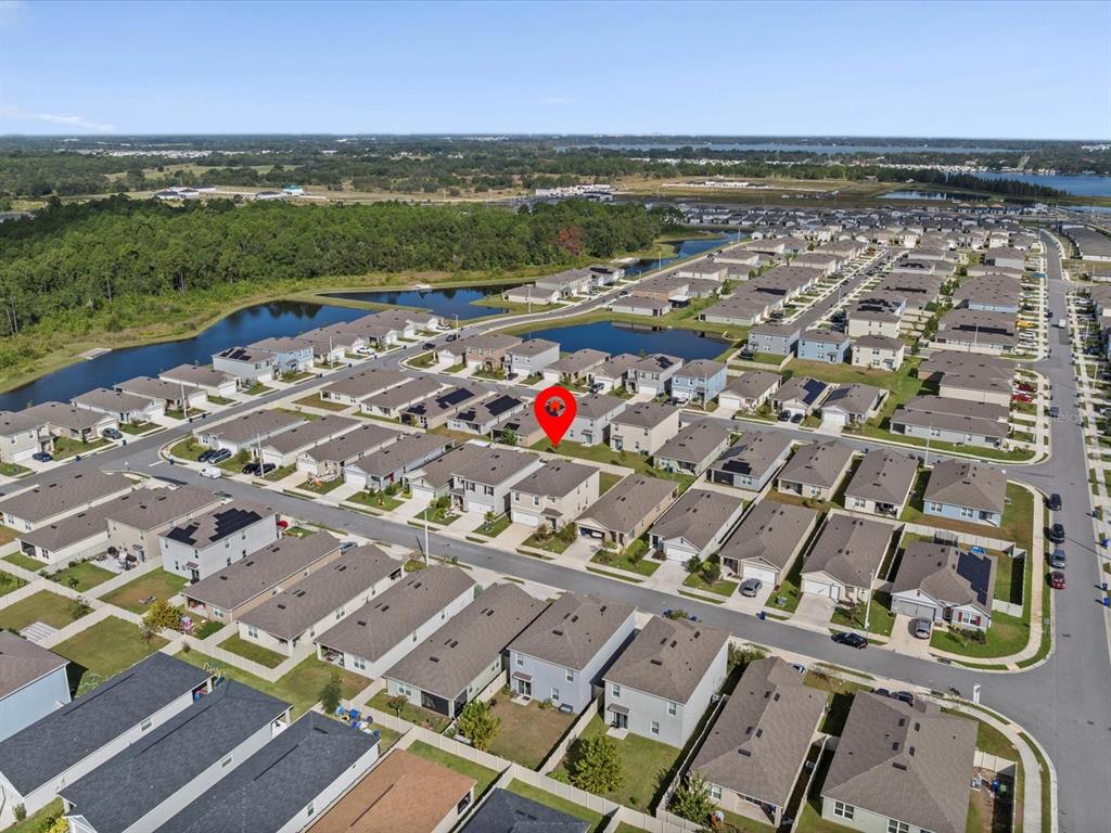 4223 San Rocco Way Winter Haven, FL 33884 - Photo 2 of 47 an aerial view of a city with ocean view