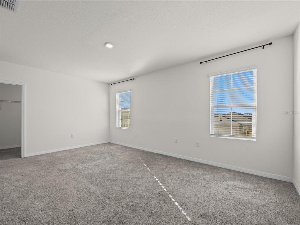 4223 San Rocco Way Winter Haven, FL 33884 - Photo 22 of 47 an empty room with a window