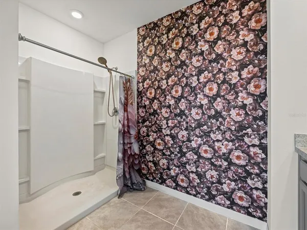 a bathroom with a shower curtain